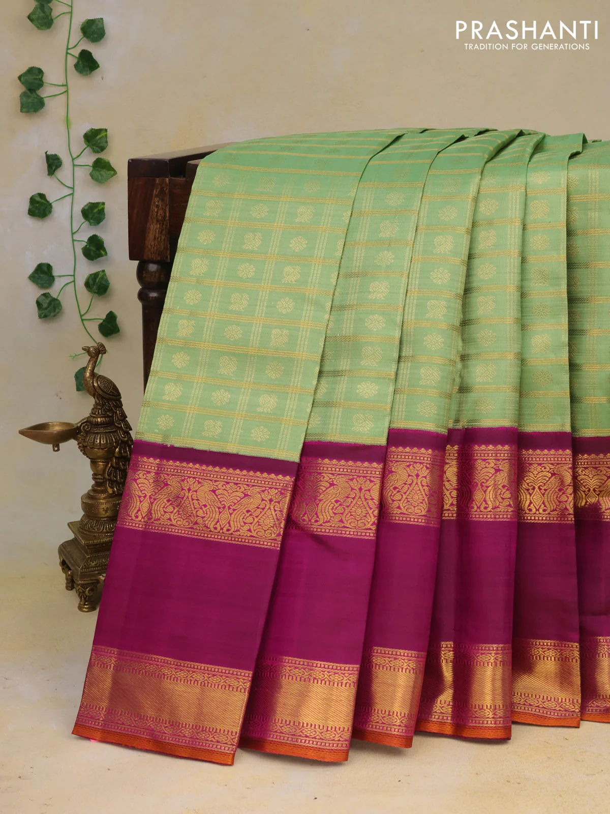 Pure kanchipuram silk saree pastel green and purple with allover zari checks & buttas and long rettapet zari woven korvai border