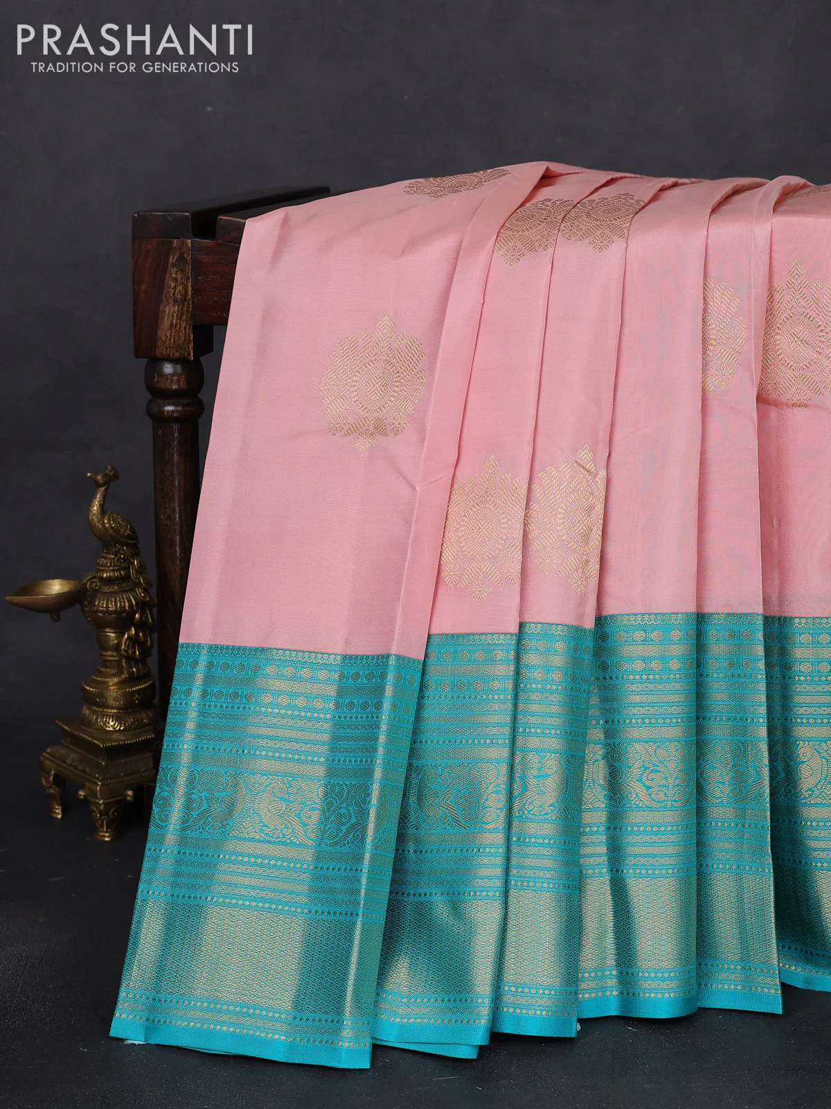 Pure kanchipuram silk saree pastel peach and teal blue with zari woven buttas and long zari woven korvai border