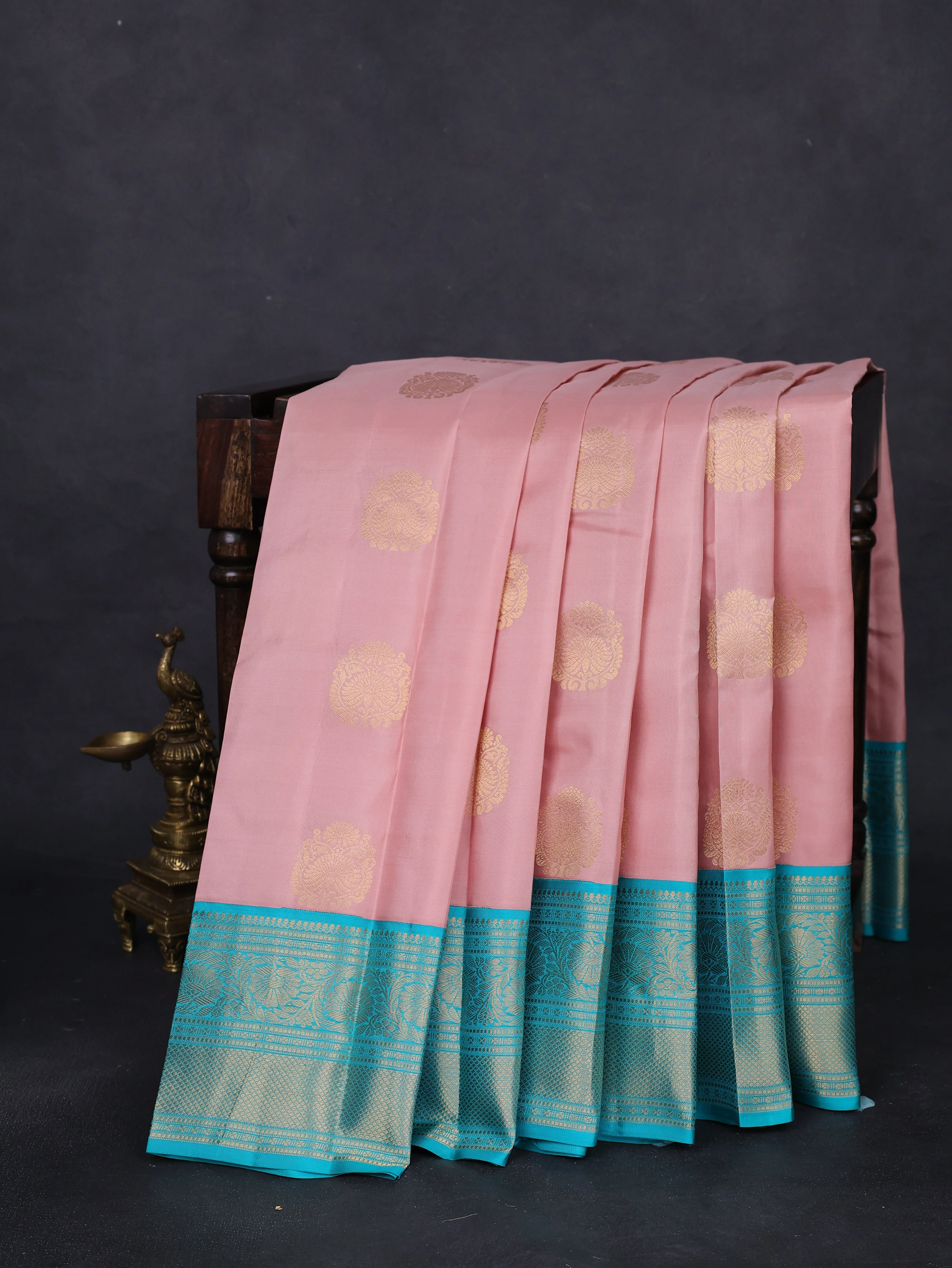 Pure kanchipuram silk saree pastel peach and teal blue with zari woven buttas and zari woven korvai border