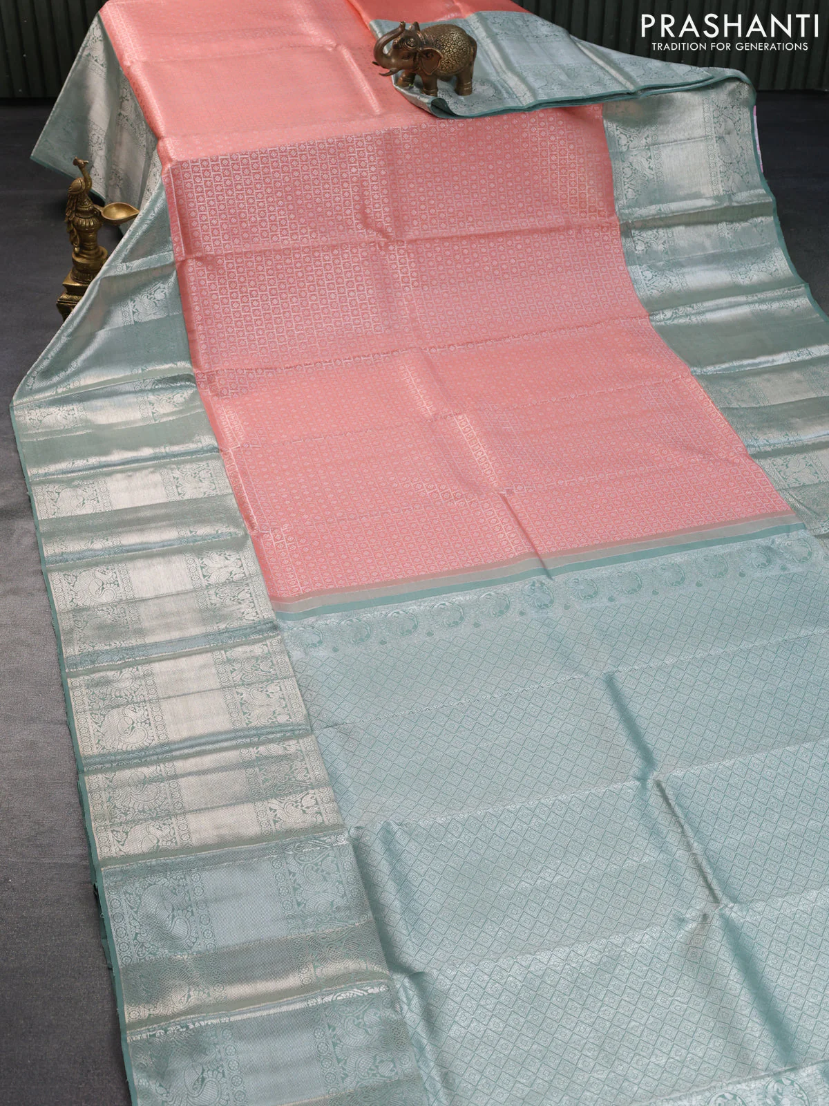 Pure kanchipuram silk saree peach shade and pastel green with allover silver zari woven brocade weaves and long silver zari woven border - Image 2