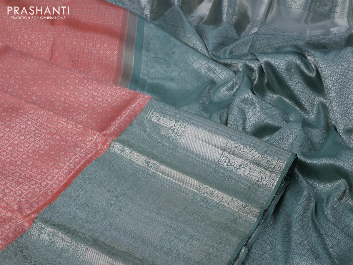 Pure kanchipuram silk saree peach shade and pastel green with allover silver zari woven brocade weaves and long silver zari woven border - Image 3