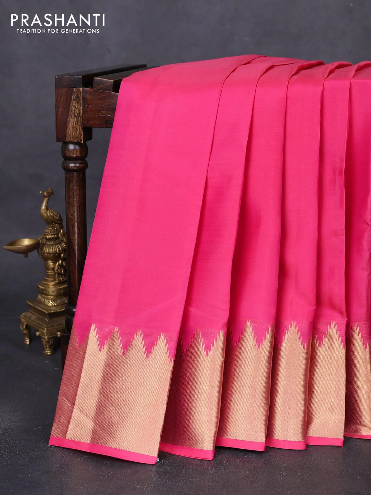 Pure kanchipuram silk saree pink with plain body and temple design zari woven border