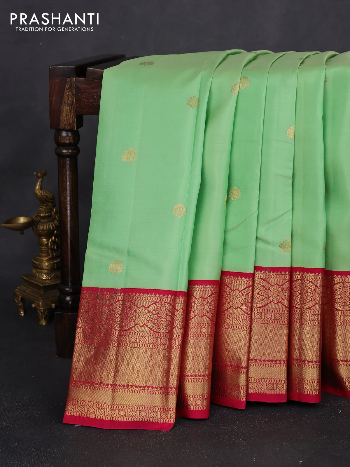 Pure kanchipuram silk saree pista green and pink with zari woven buttas and rich zari woven korvai border