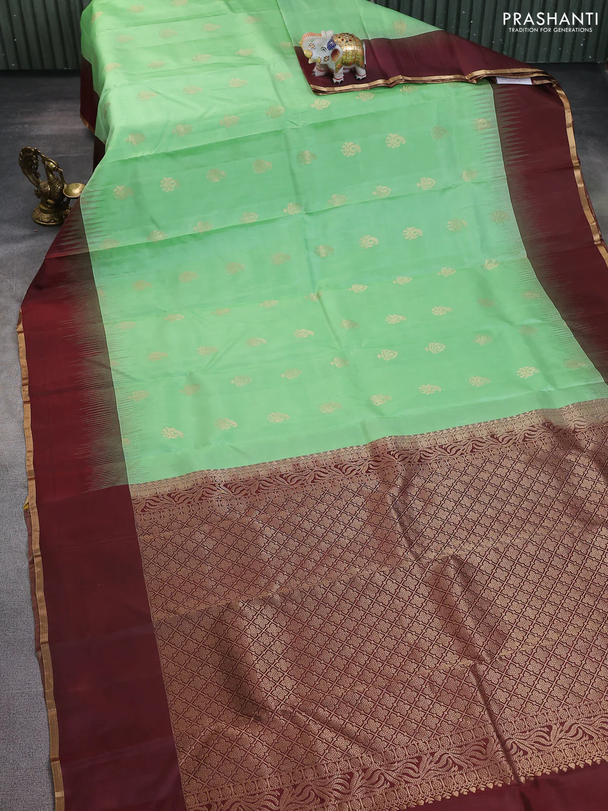 Pure kanchipuram silk saree pista green and wine shade with zari woven buttas and simple zari woven border - Image 2