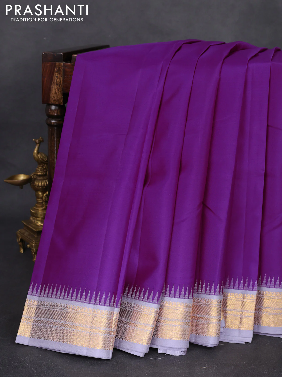 Pure kanchipuram silk saree purple and pastel grey with plain body and temple design zari woven border