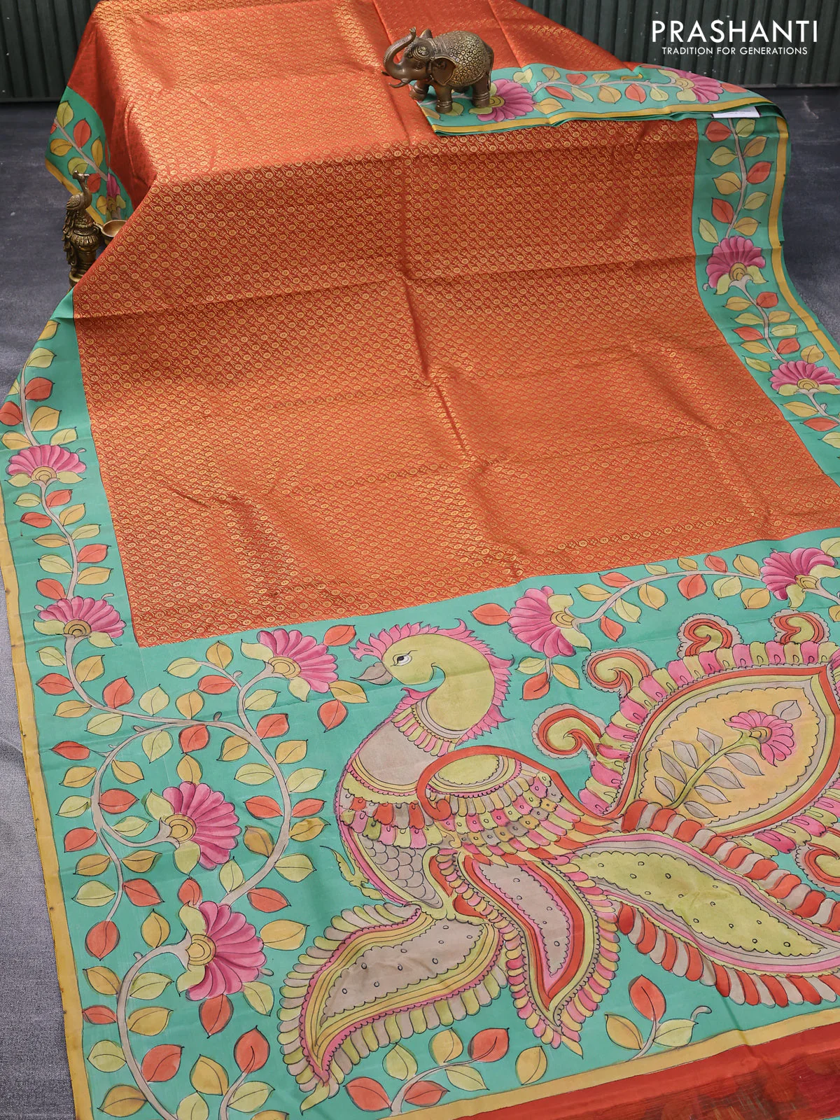 Pure kanchipuram silk saree rustic orange and teal blue shade with allover zari woven brocade weaves and kalamkari printed pallu & border - Image 2
