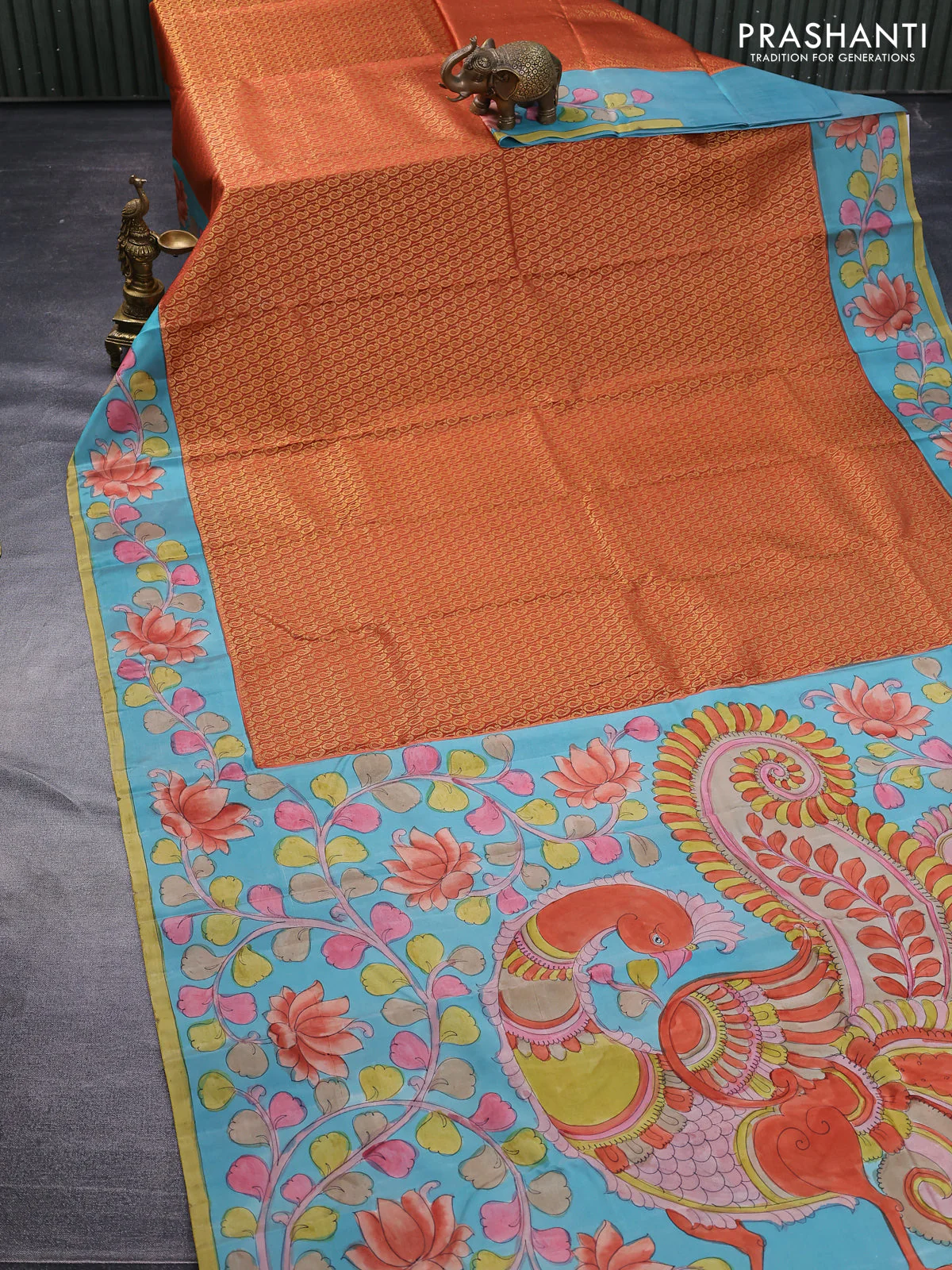 Pure kanchipuram silk saree rustic orange and teal blue with allover zari woven paisley brocade weaves and kalamkari printed pallu & border - Image 2