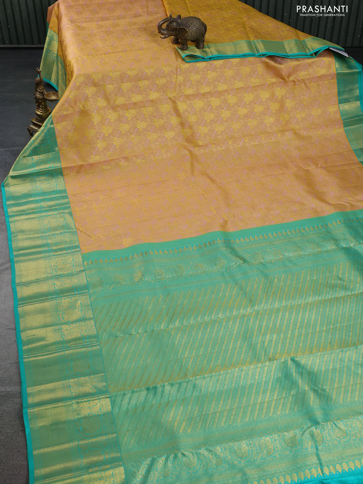Pure kanchipuram silk saree sandal and teal green with allover zari woven brocade weaves and zari woven border - Image 2