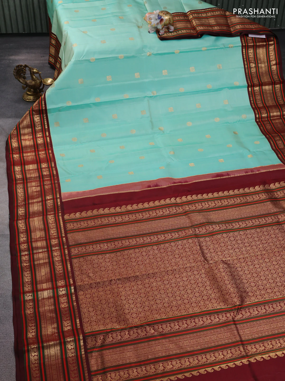 Pure kanchipuram silk saree teal blue and deep maroon with zari woven buttas and rich zari woven korvai border - Image 2