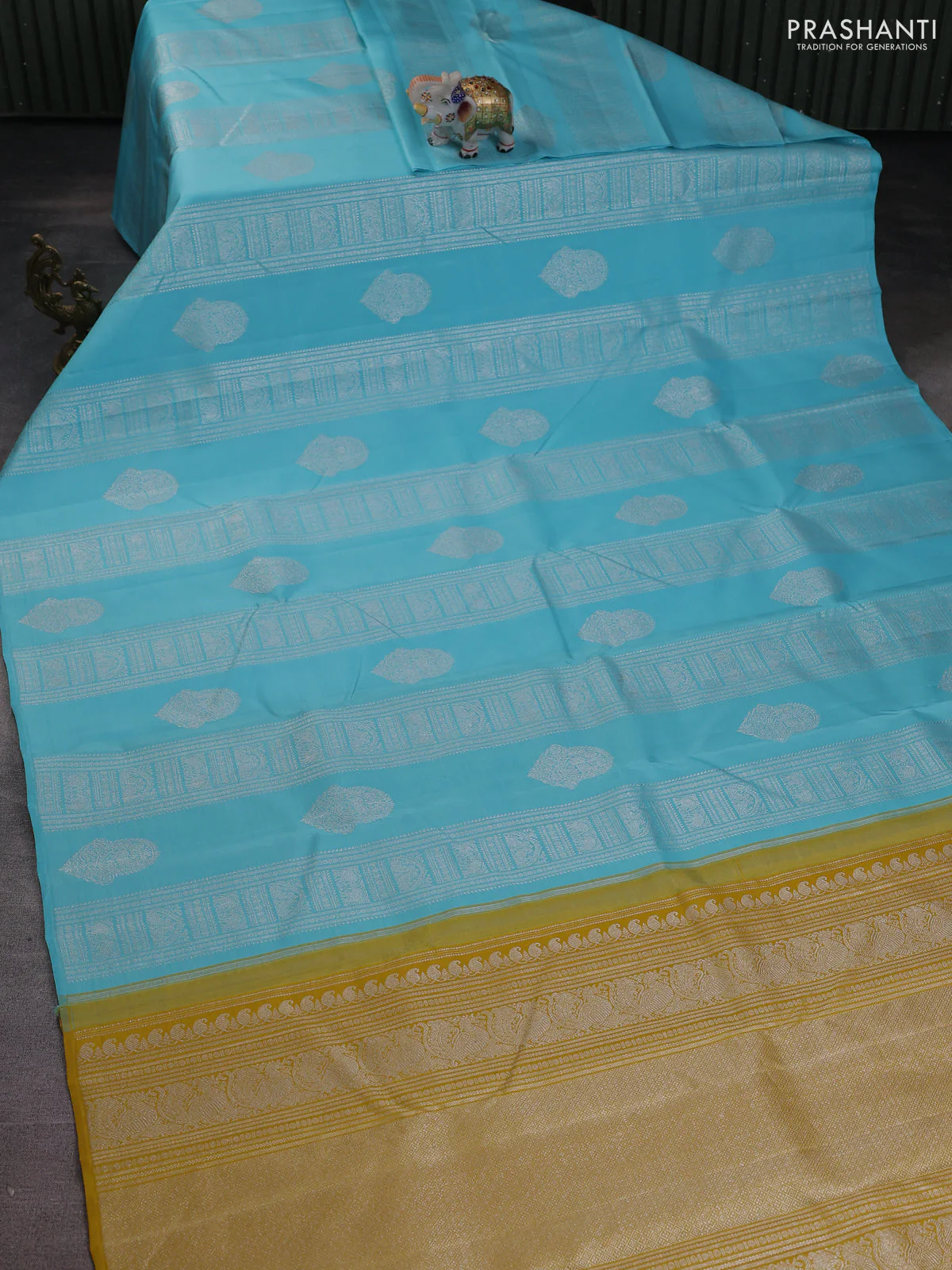 Pure kanchipuram silk saree teal blue and mustard yellow with allover silver zari weaves & buttas in borderless style - Image 2