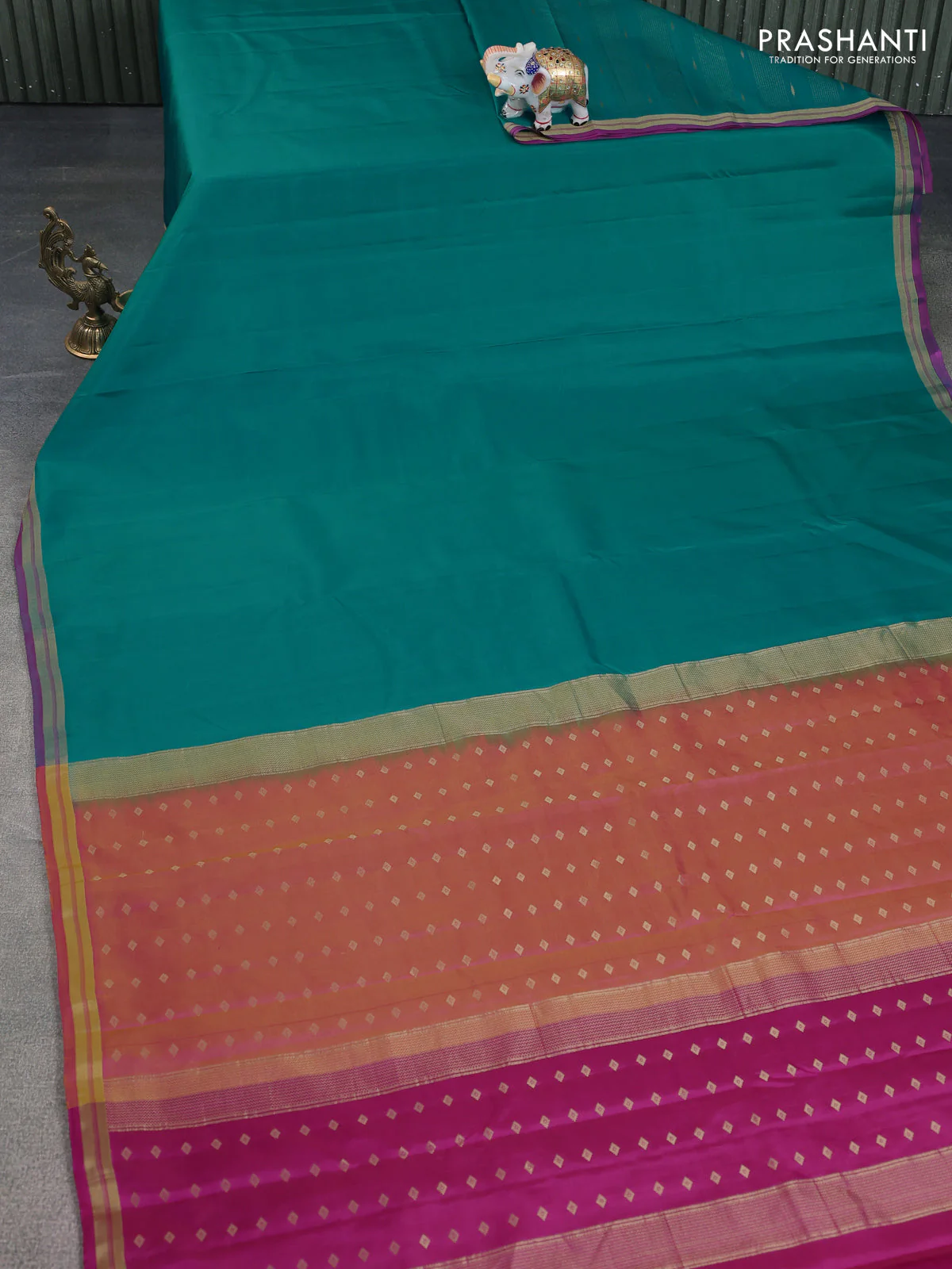 Pure kanchipuram silk saree teal blue and pink with plain body and zari woven border - Image 2