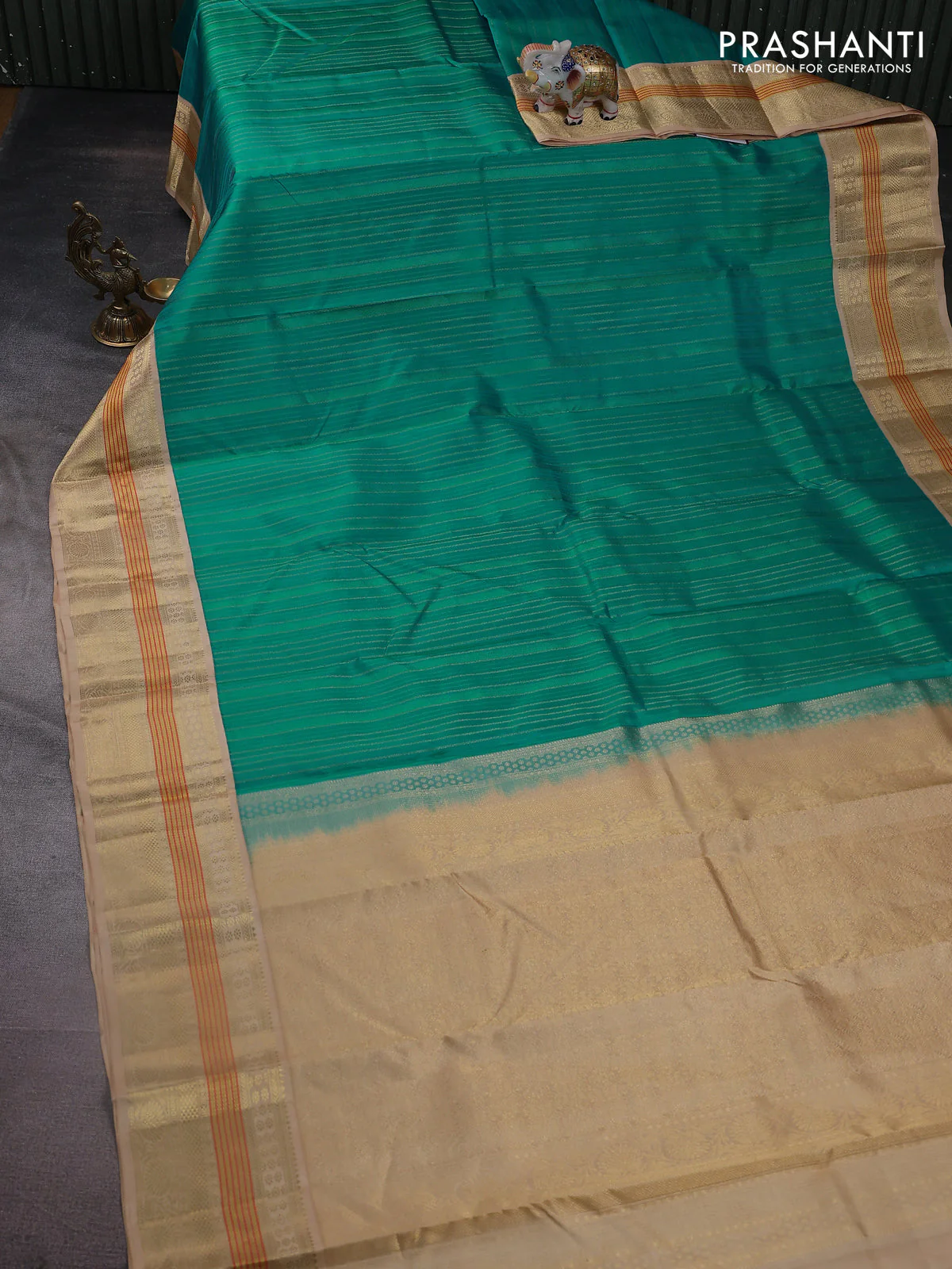 Pure kanchipuram silk saree teal blue and sandal with allover self emboss & zari weaves and zari woven korvai border - Image 2