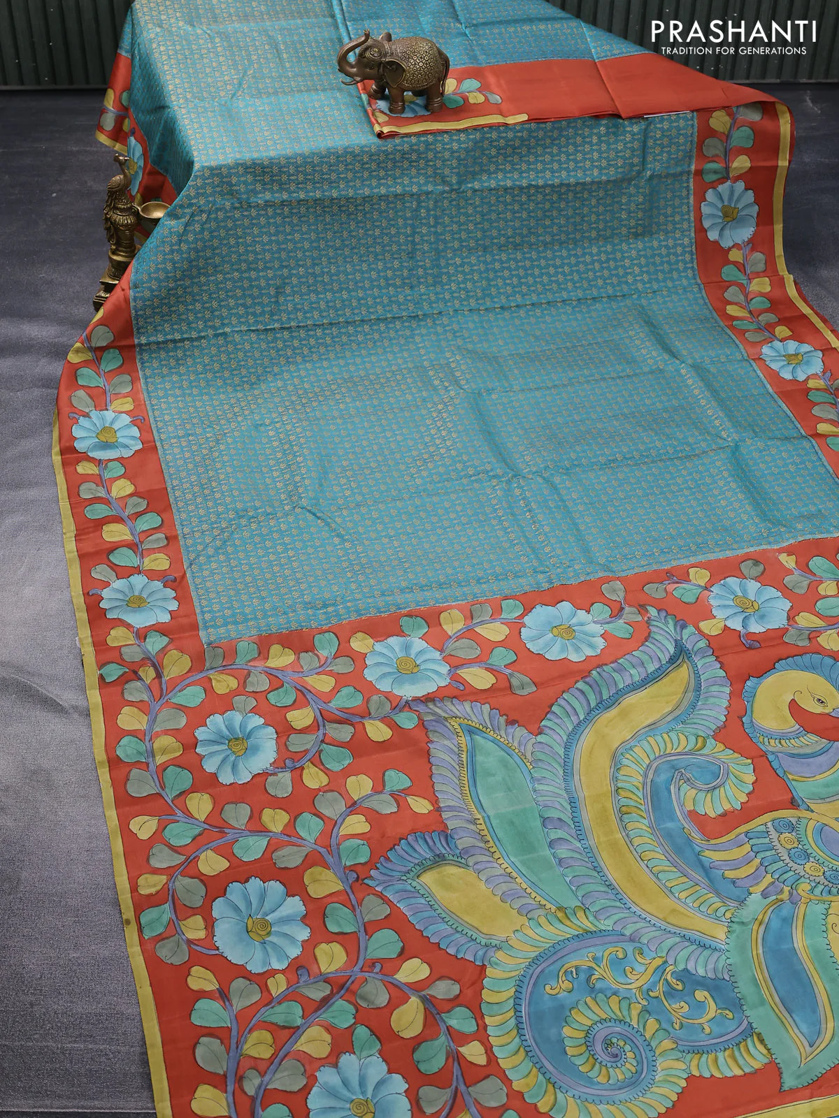 Pure kanchipuram silk saree teal blue shade and rustic orange with allover zari woven brocade weaves and kalamkari printed pallu & border - Image 2