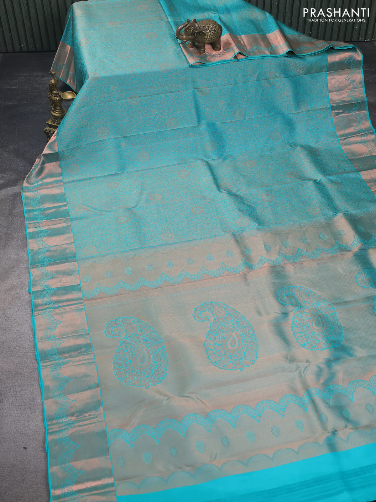 Pure kanchipuram silk saree teal blue shade with allover copper zari wevaes and copper zari woven border - Image 2