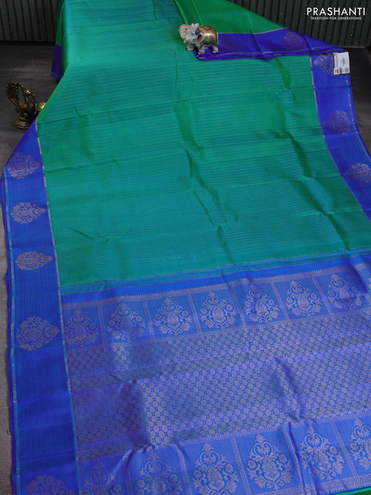 Pure kanchipuram silk saree teal green and blue with allover zari stripe pattern and zari woven butta border - Image 2