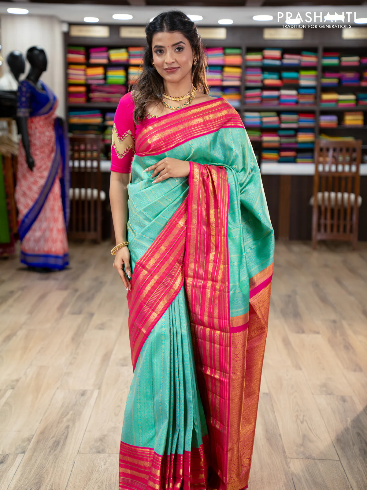 Pure kanchipuram silk saree teal green and pink with allover zari woven brocade weaves and zari woven korvai border