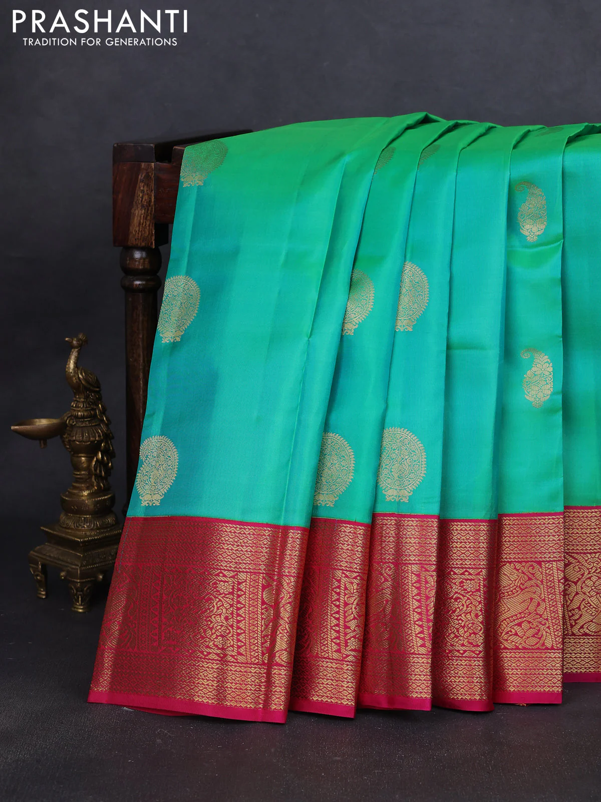 Pure kanchipuram silk saree teal green and pink with paisley zari woven buttas and zari woven korvai border