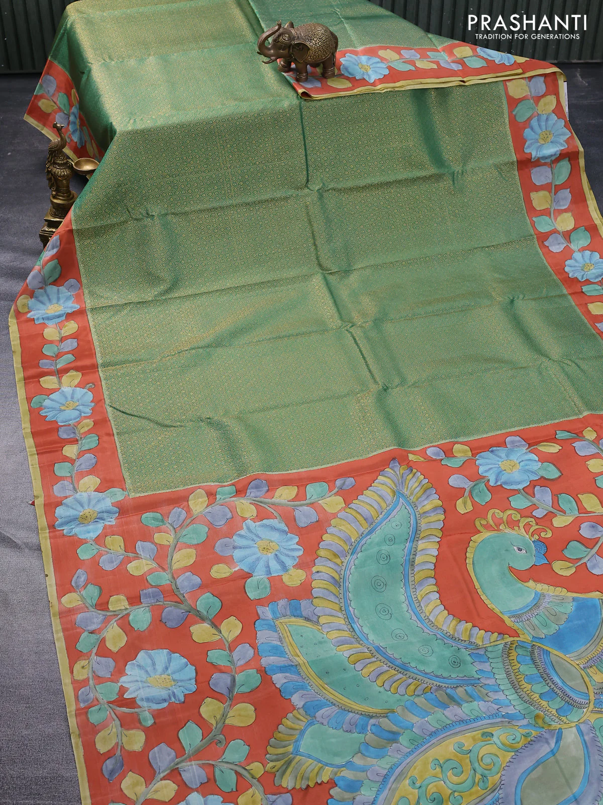 Pure kanchipuram silk saree teal green and rustic orange with allover zari woven geometric brocade weaves and kalamkari printed pallu & border - Image 2