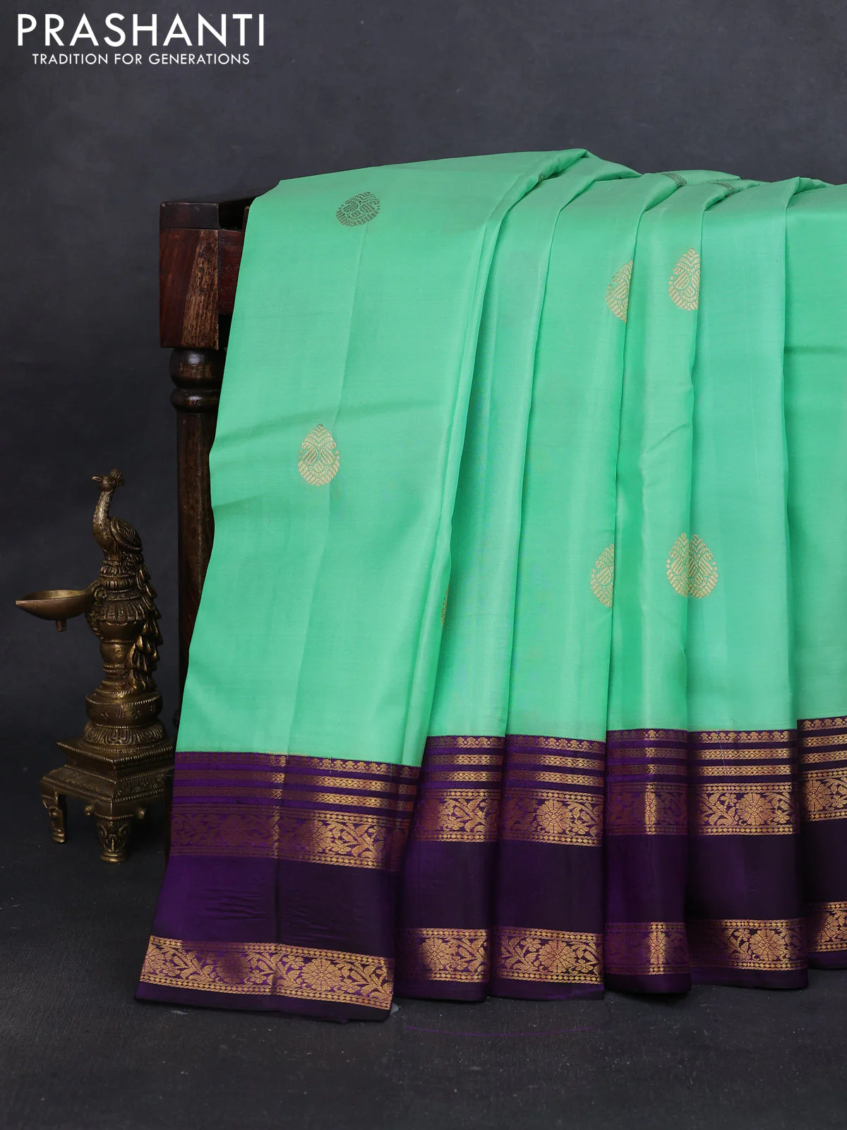 Pure kanchipuram silk saree teal green and violet with zari woven buttas and rettapet zari woven korvai border