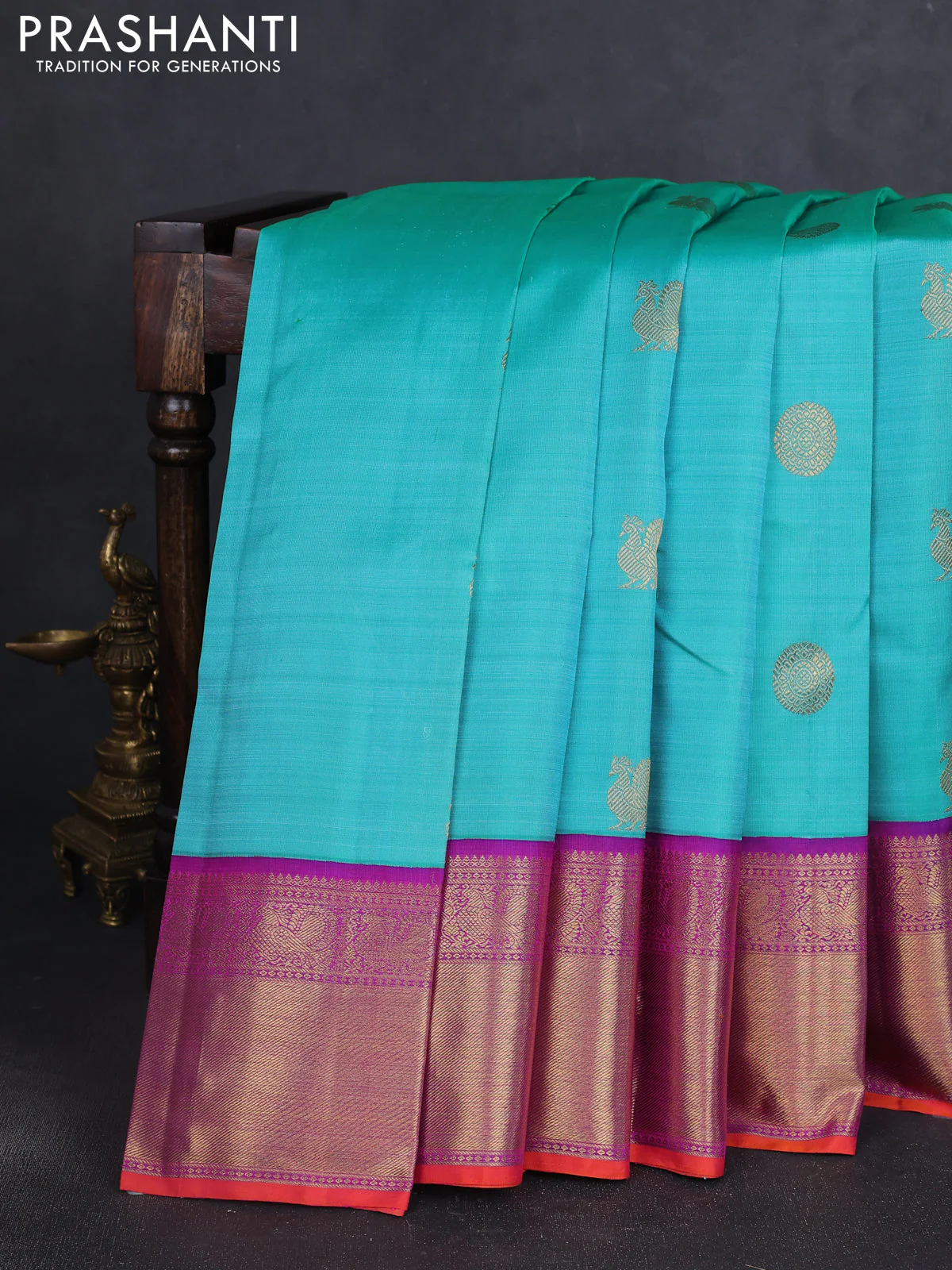 Pure kanchipuram silk saree teal green shade and purple with annam & rudhraksha zari woven buttas and rich zari woven korvai border