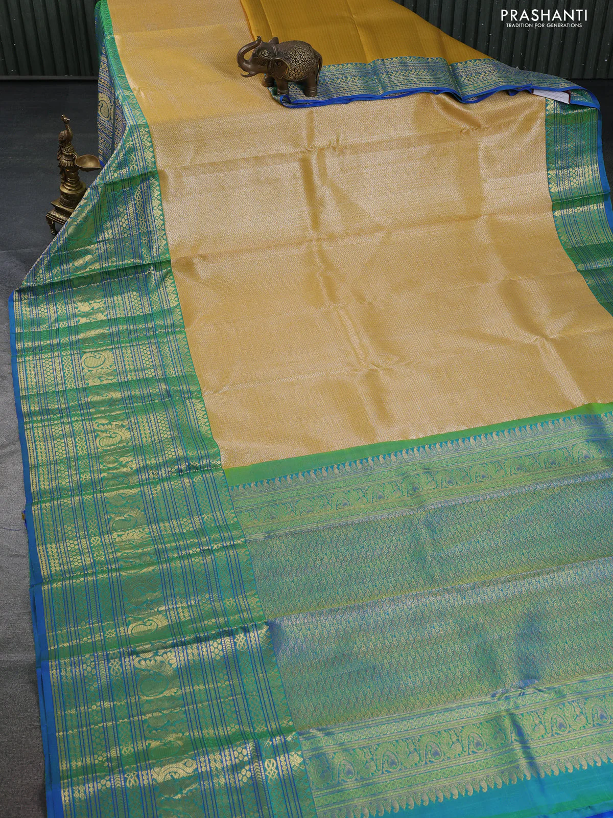 Pure kanchipuram silk saree yellow and blue with allover silver zari woven brocade weaves and long zari woven border - Image 2