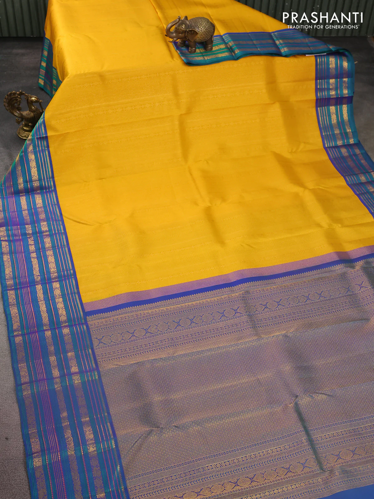 Pure kanchipuram silk saree yellow and peacock blue with allover zari woven brocade weaves and zari woven korvai border - Image 2