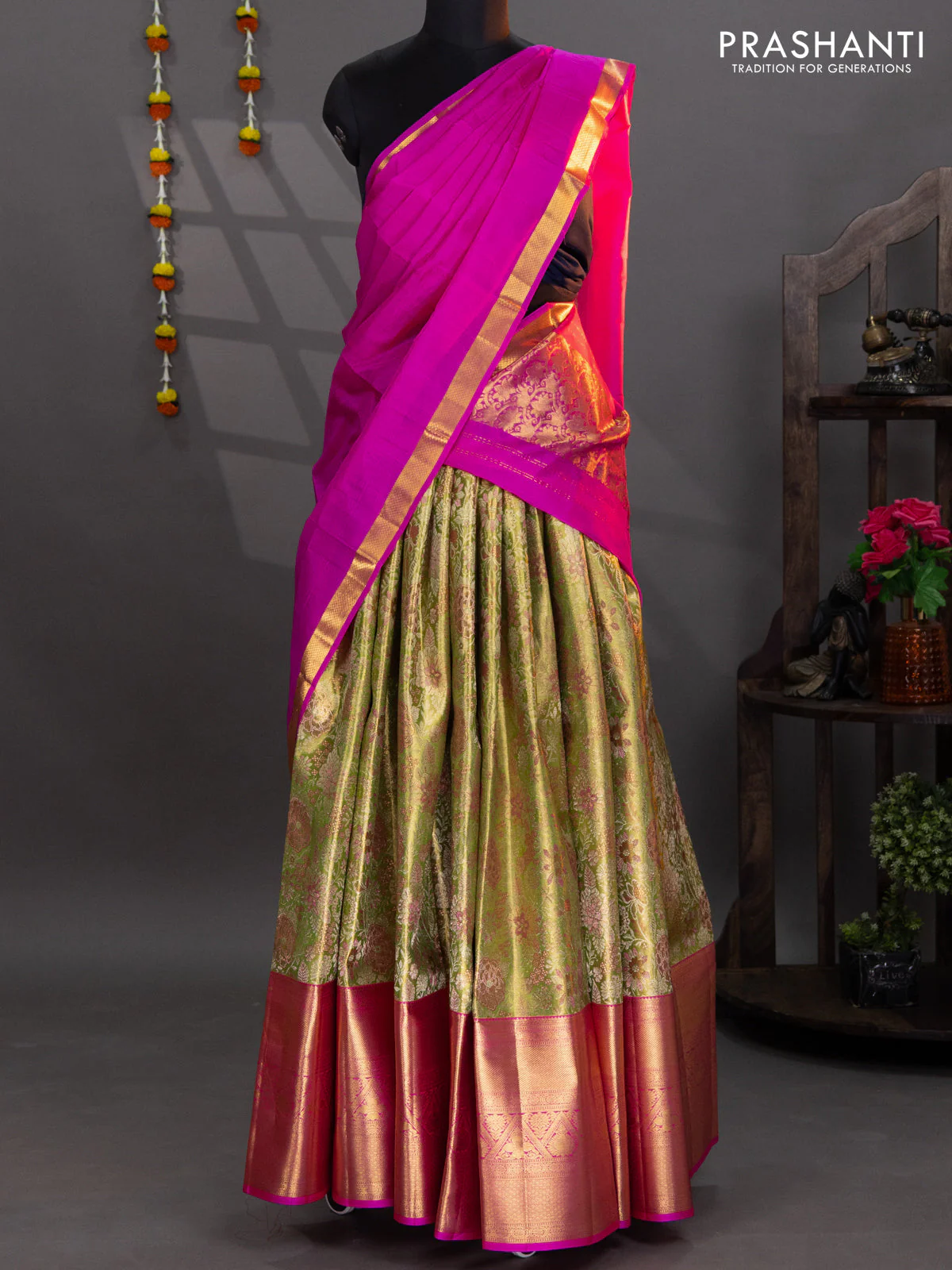 Pure kanchipuram tissue silk lehenga lime green and pink with allover brocade weaves and long zari woven border