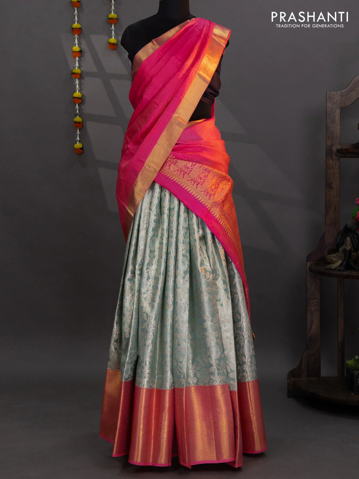 Pure kanchipuram tissue silk lehenga pastel blue and peach pink with allover brocade weaves and long zari woven border