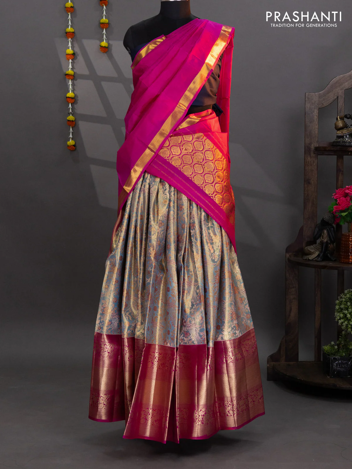 Pure kanchipuram tissue silk lehenga teal blue shade and pink with allover brocade weaves and long zari woven border