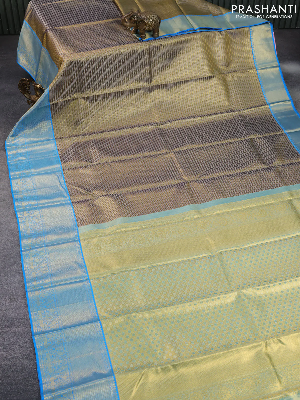 Pure kanchipuram tissue silk saree dual shade of blackish gold and cs blue with allover zari weaves and zari woven border - Image 2