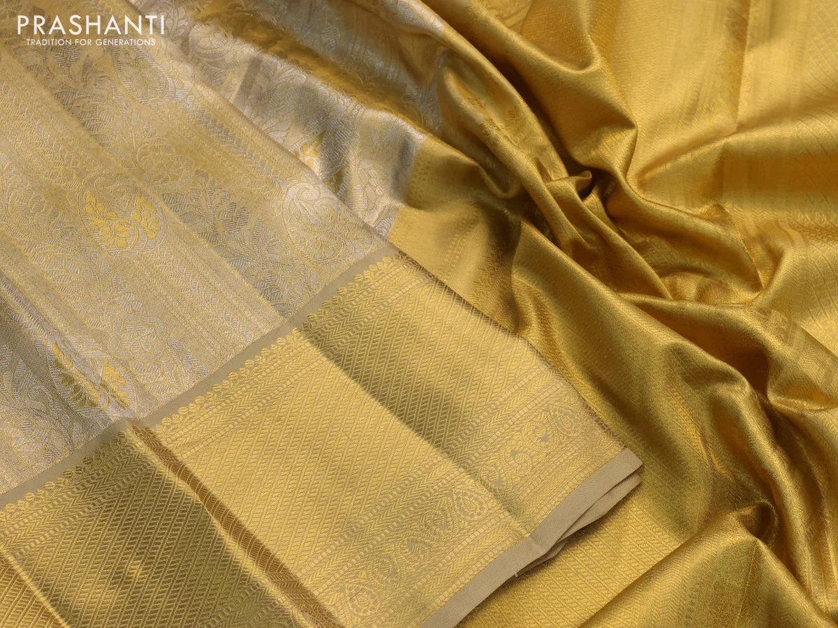Pure kanchipuram tissue silk saree dual shade of gold and beige with allover silver zari woven brocade weaves and zari woven border - Image 3