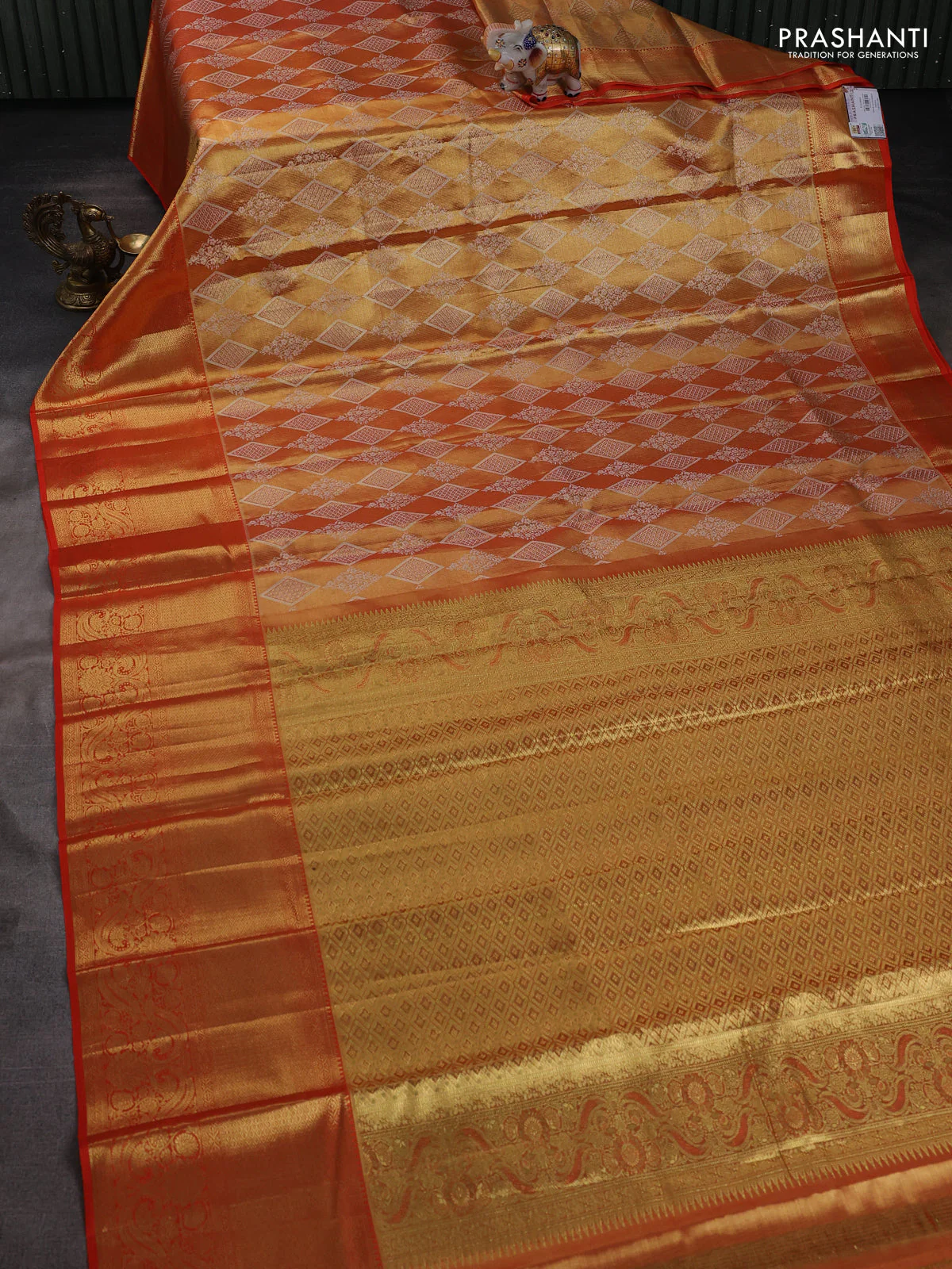 Pure kanchipuram tissue silk saree dual shade of orange and orange with allover zari woven brocade weaves and long zari woven border - Image 2