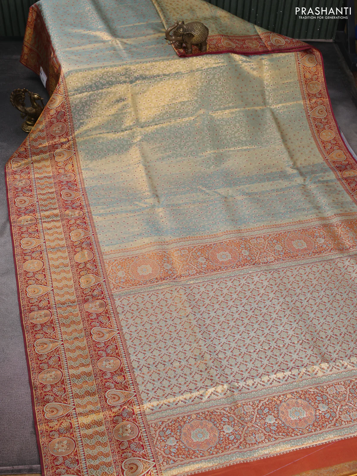 Pure Kanchipuram tissue silk saree dual shade of pastel blue and maroon with allover zari woven brocade weaves and long zari woven border - Image 2