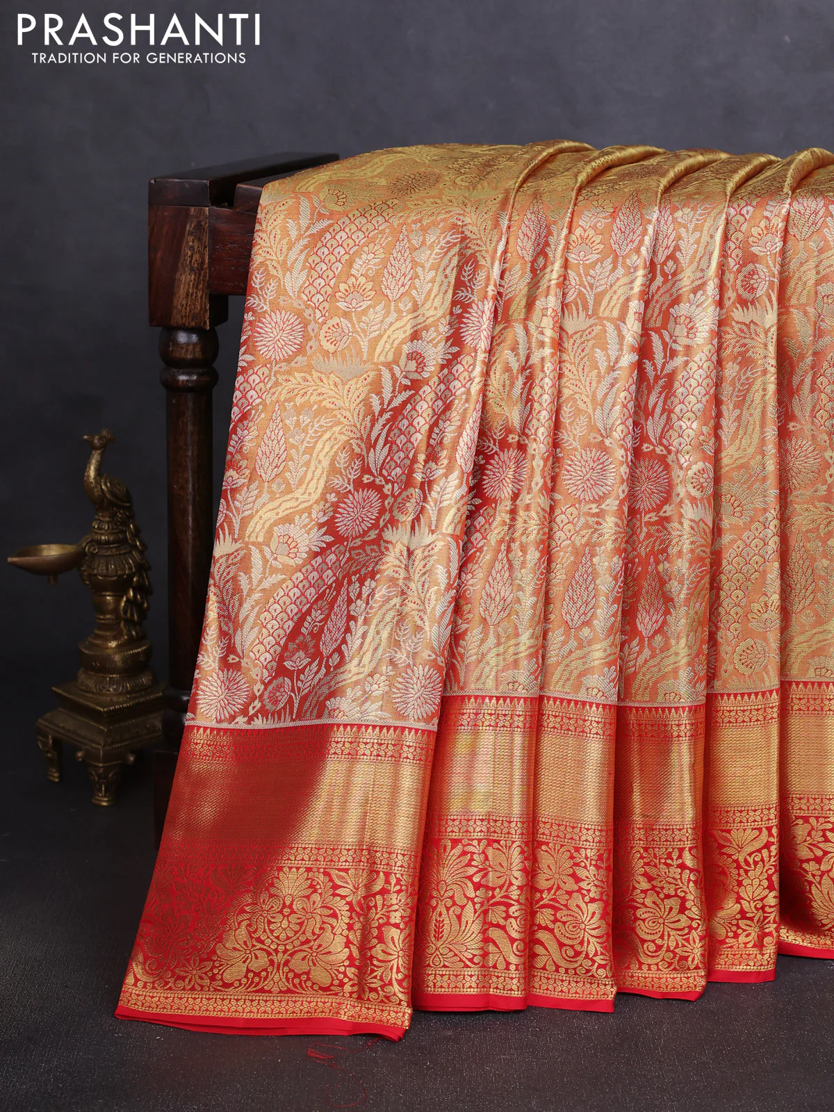 Pure kanchipuram tissue silk saree dual shade of red and red with allover floral zari woven brocade weaves and zari woven border