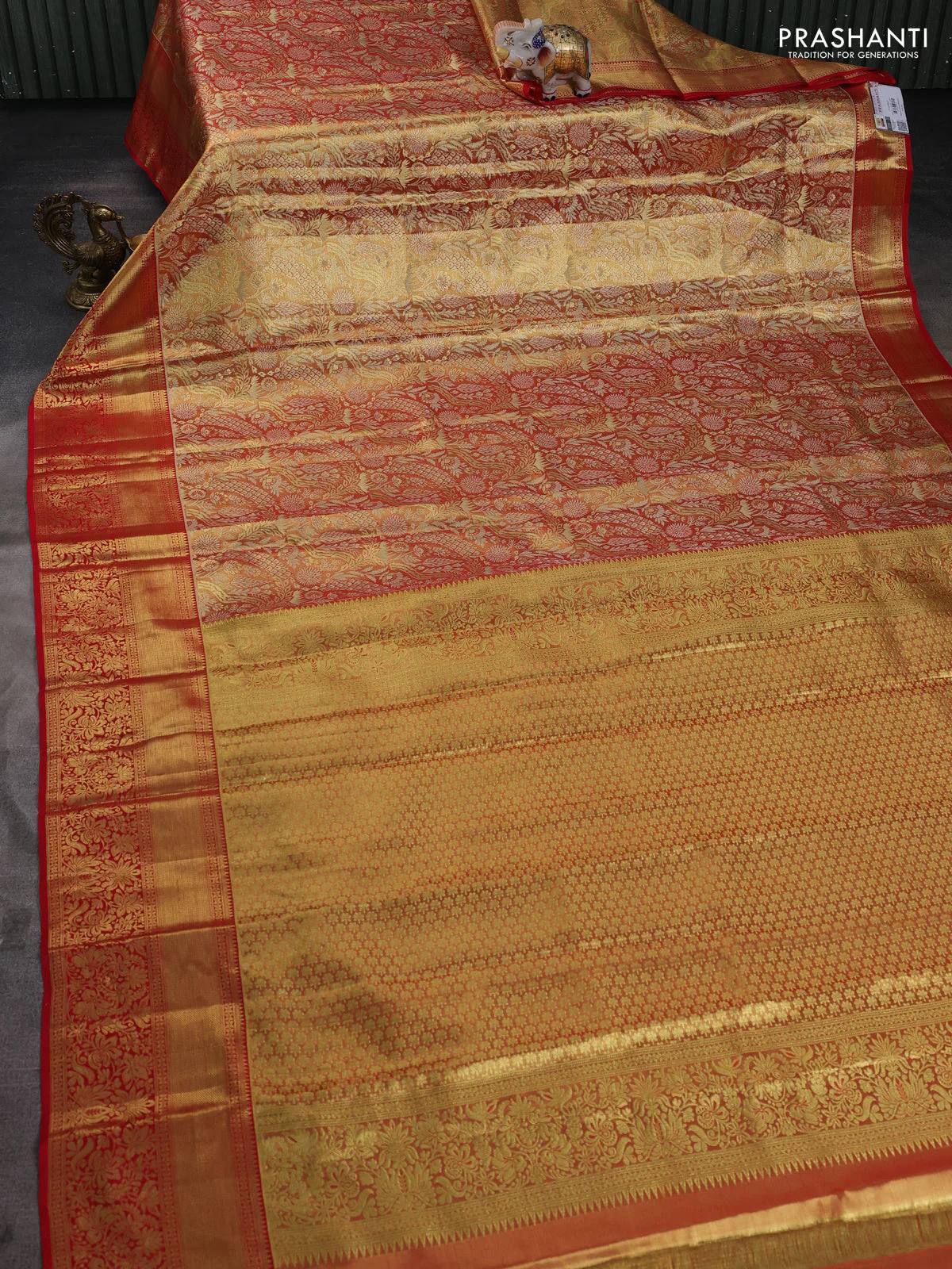 Pure kanchipuram tissue silk saree dual shade of red and red with allover floral zari woven brocade weaves and zari woven border - Image 2