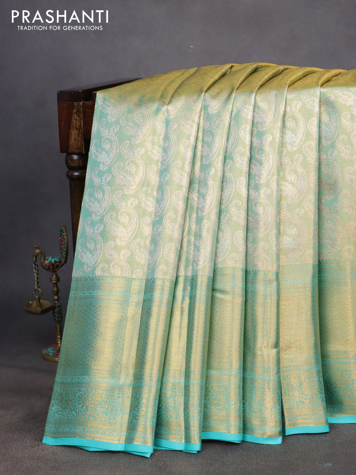 Pure kanchipuram tissue silk saree dual shade of teal blue with allover silver zari woven brocade weaves and long zari woven border - Image 9