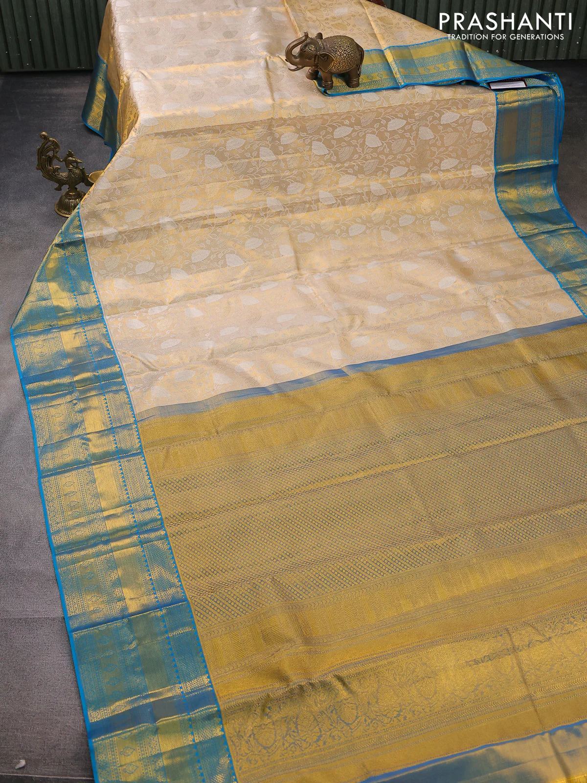Pure kanchipuram tissue silk saree gold and cs blue with allover silver zari woven brocade weaves and zari woven border - Image 2