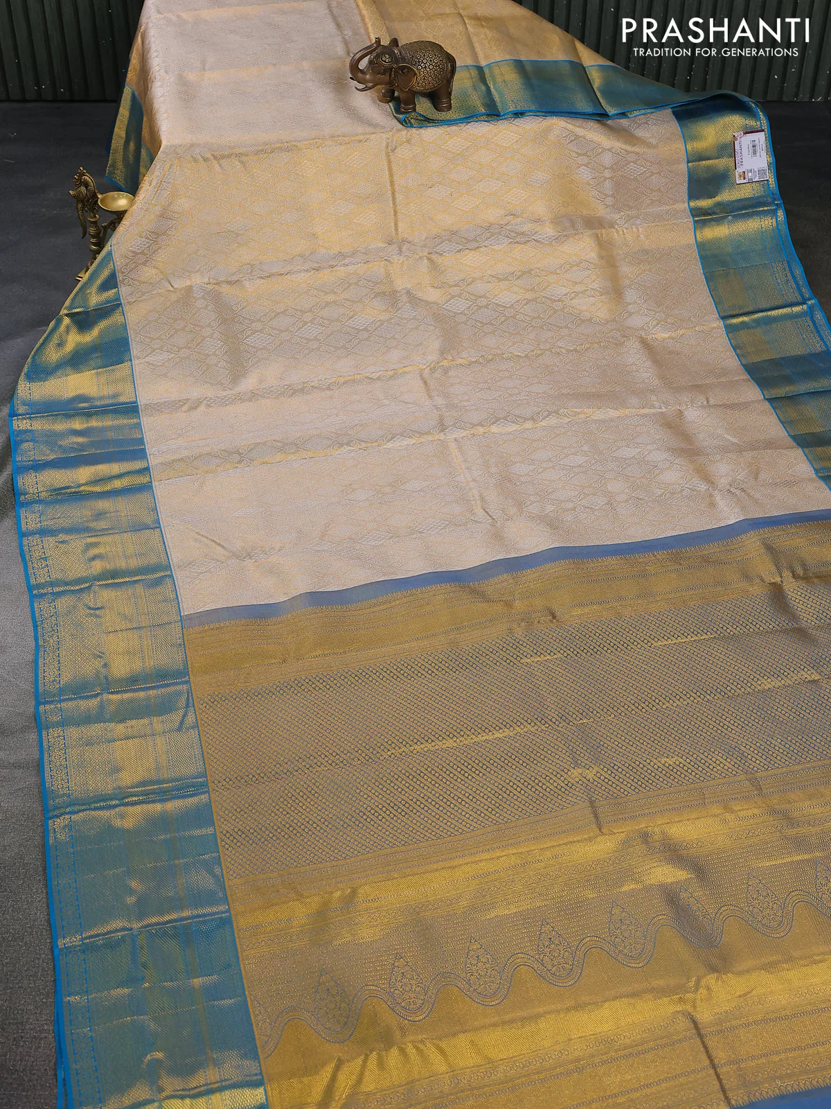 Pure kanchipuram tissue silk saree gold and cs blue with allover silver zari woven brocade weaves and zari woven border - Image 2