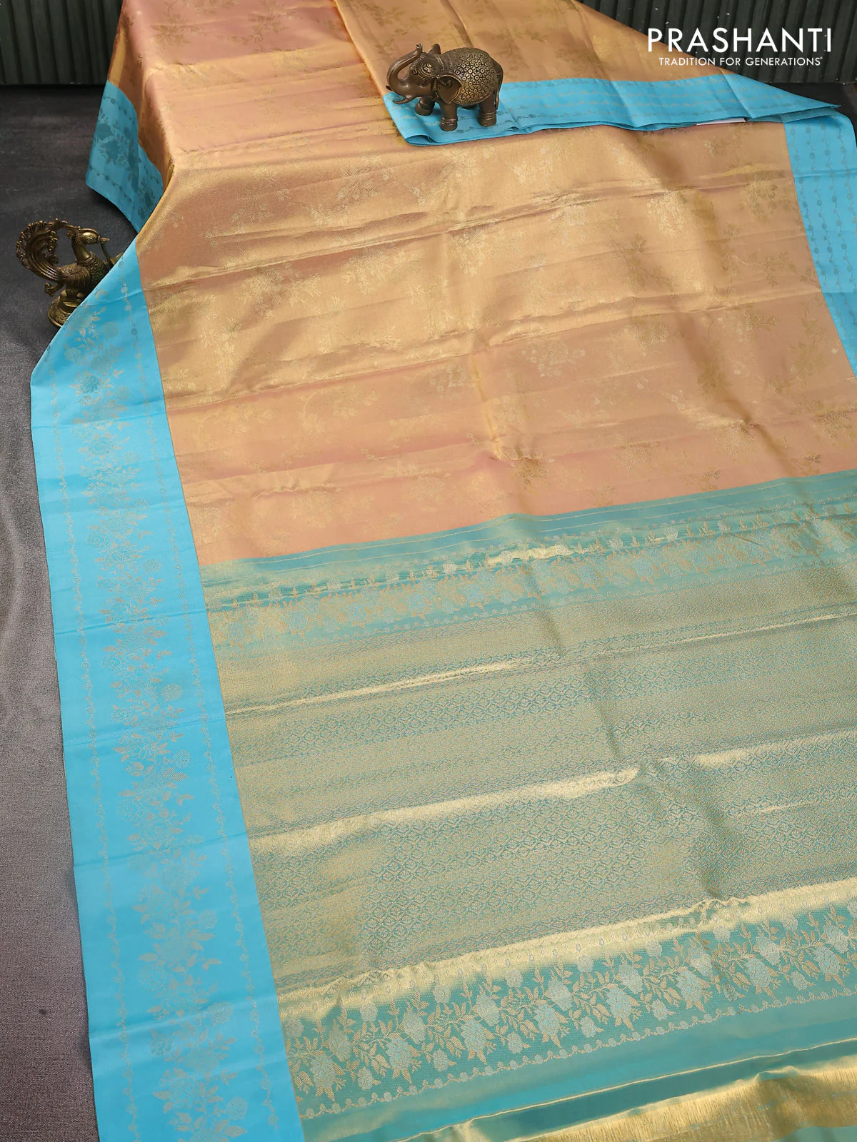 Pure kanchipuram Tissue silk saree gold and light blue with allover zari weaves and floral design zari border - Image 2