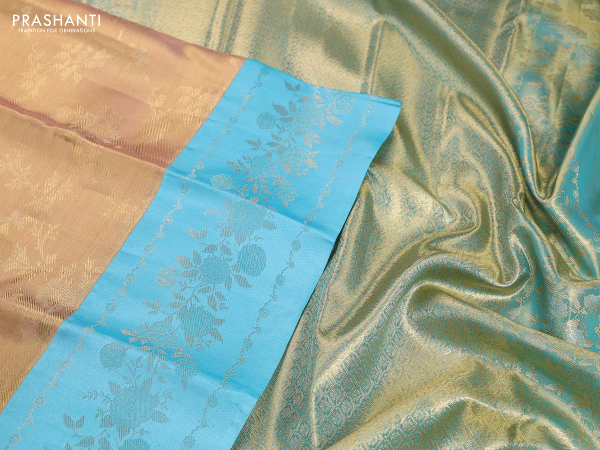 Pure kanchipuram Tissue silk saree gold and light blue with allover zari weaves and floral design zari border - Image 3