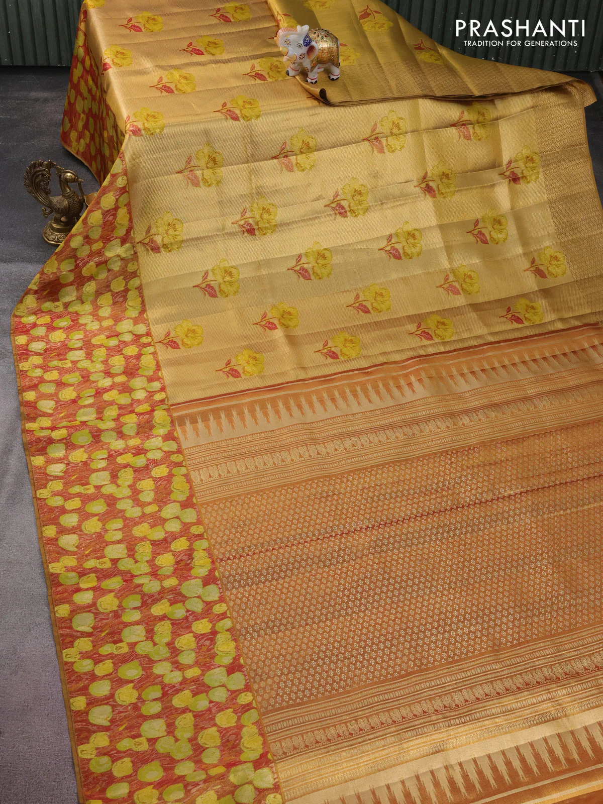 Pure kanchipuram tissue silk saree gold and maroon with floral design motif and long rich floral design border - Image 2