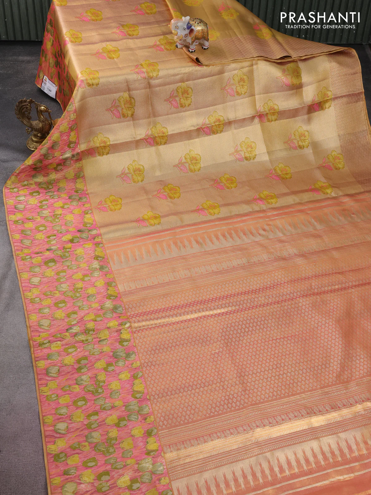 Pure kanchipuram tissue silk saree gold and peach pink with floral design motif and long rich floral design border - Image 2
