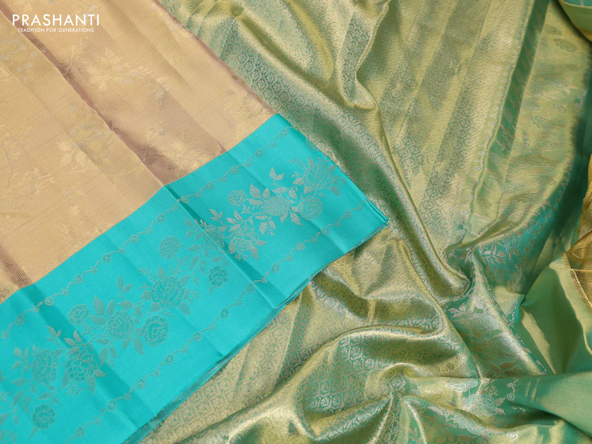 Pure kanchipuram Tissue silk saree gold and teal green with allover zari weaves and floral design zari border - Image 3