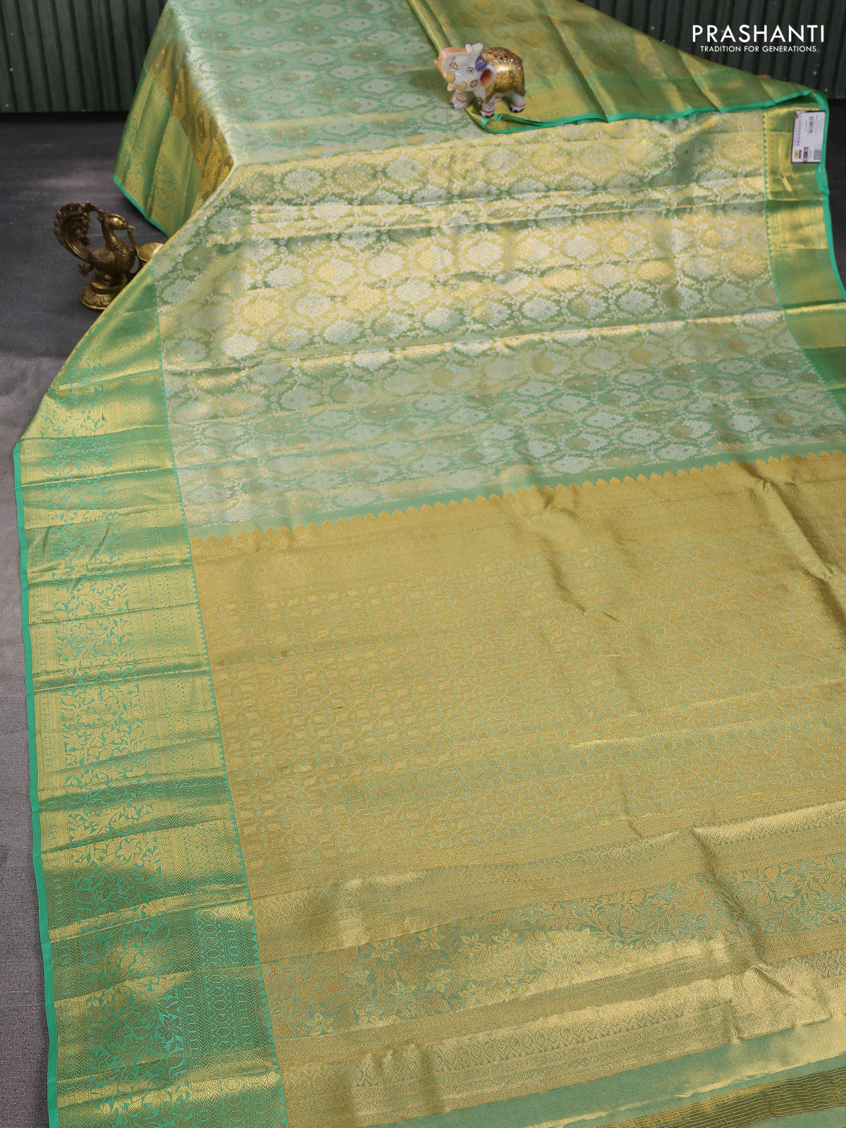 Pure kanchipuram tissue silk saree golden teal and teal green shade with allover zari woven brocade weaves and long rich zari woven border - Image 2