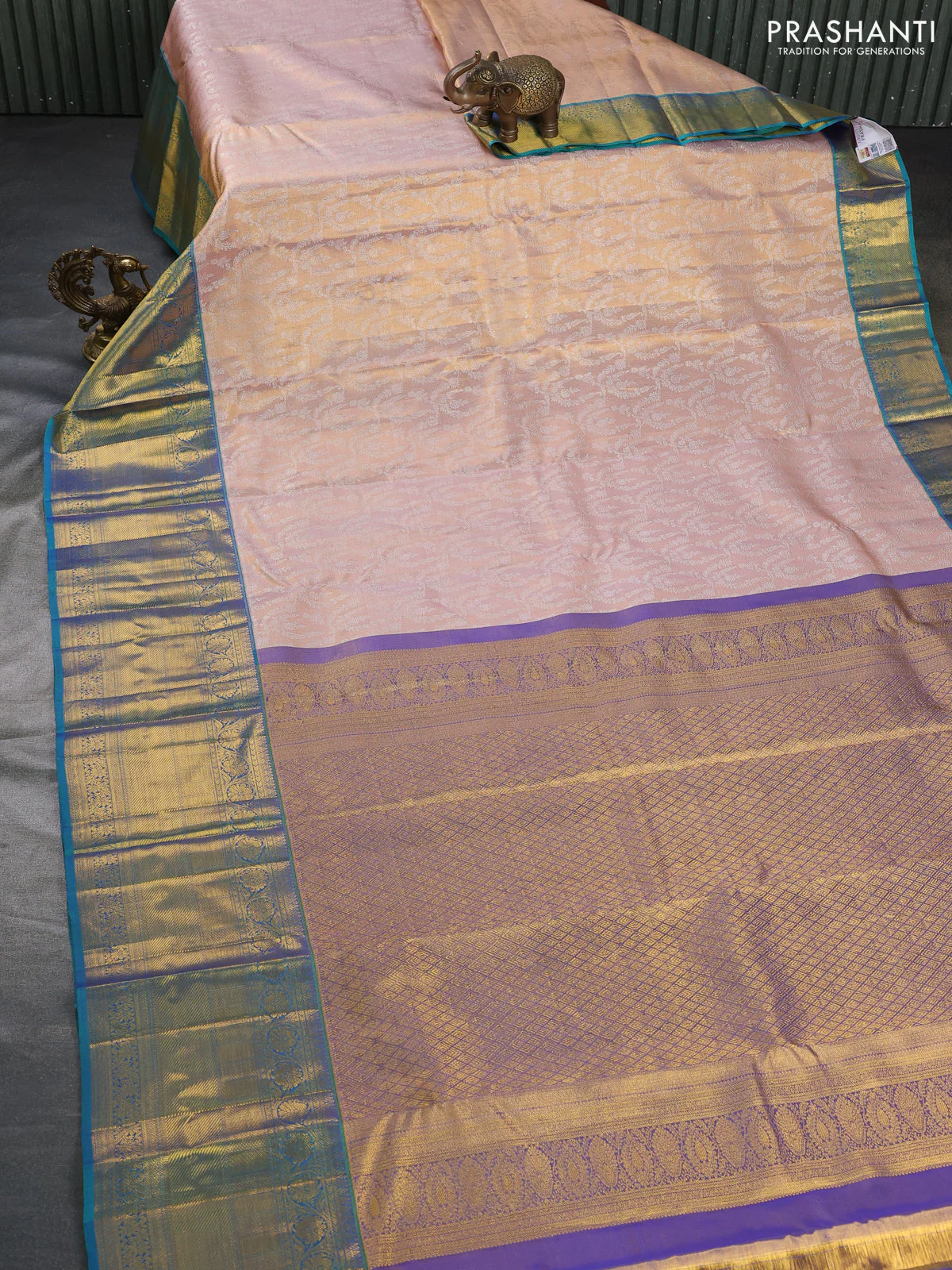 Pure kanchipuram tissue silk saree mild peach and dual shade of bluish green with allover silver zari woven brocade weaves and long zari woven border - Image 2