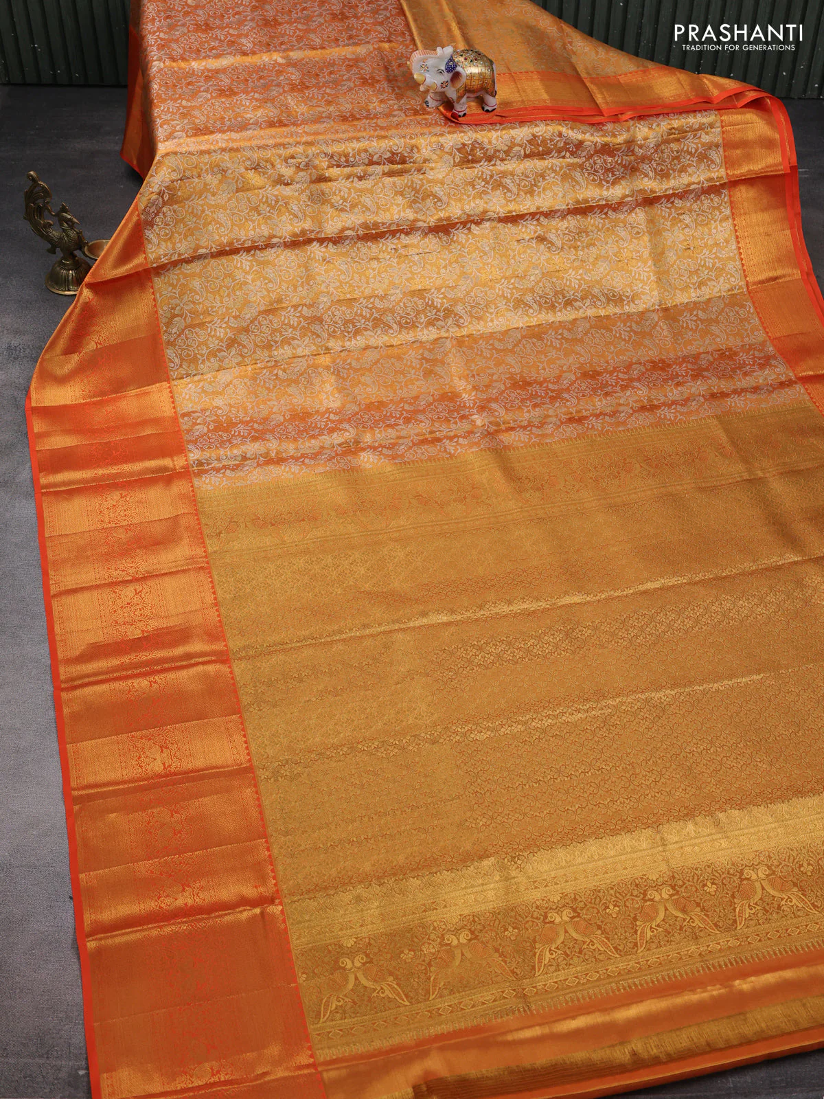 Pure kanchipuram tissue silk saree orange with allover silver zari woven brocade weaves and zari woven border - Image 2