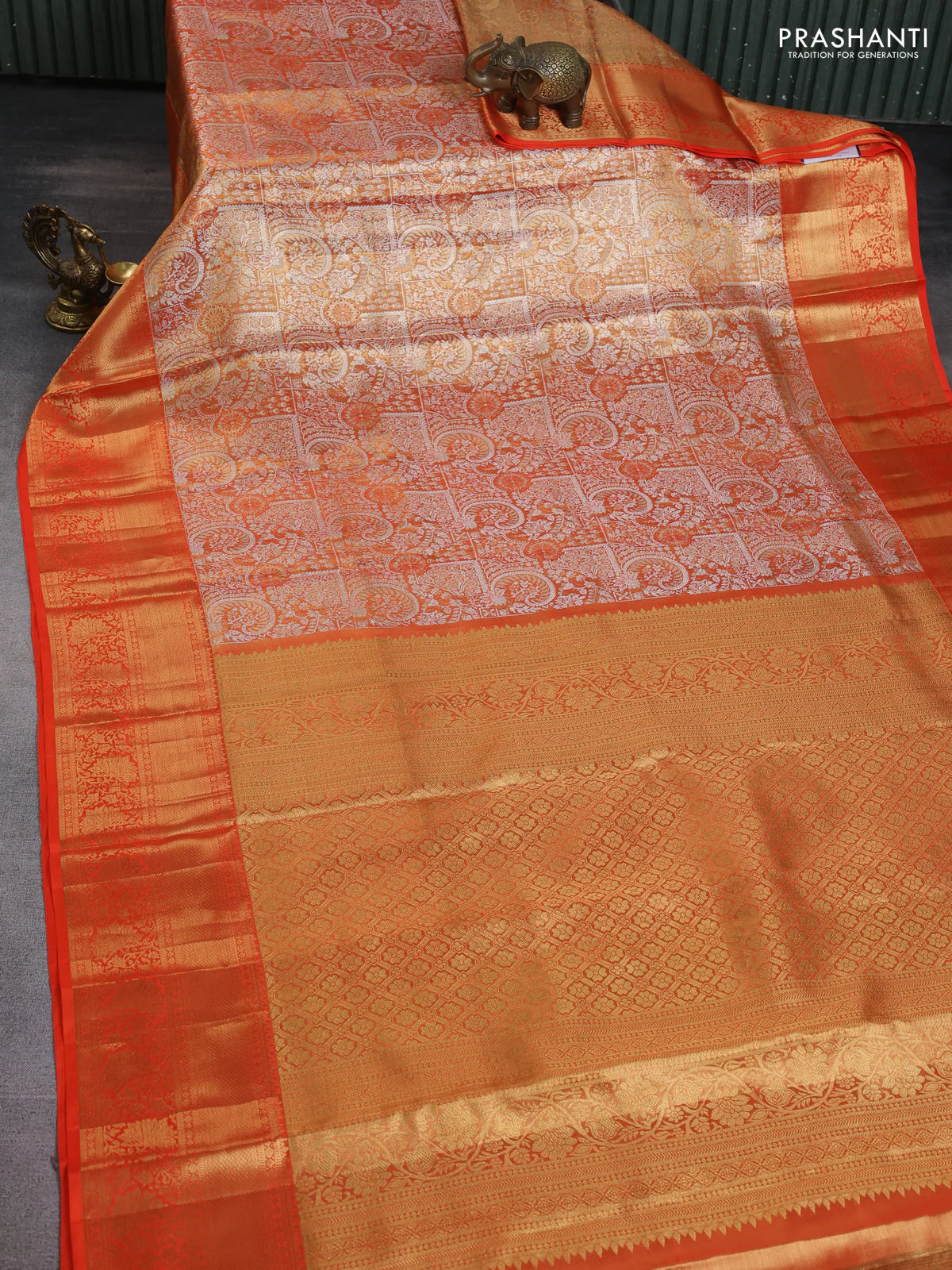 Pure kanchipuram tissue silk saree orange with allover silver zari woven brocade weaves and zari woven border - Image 2