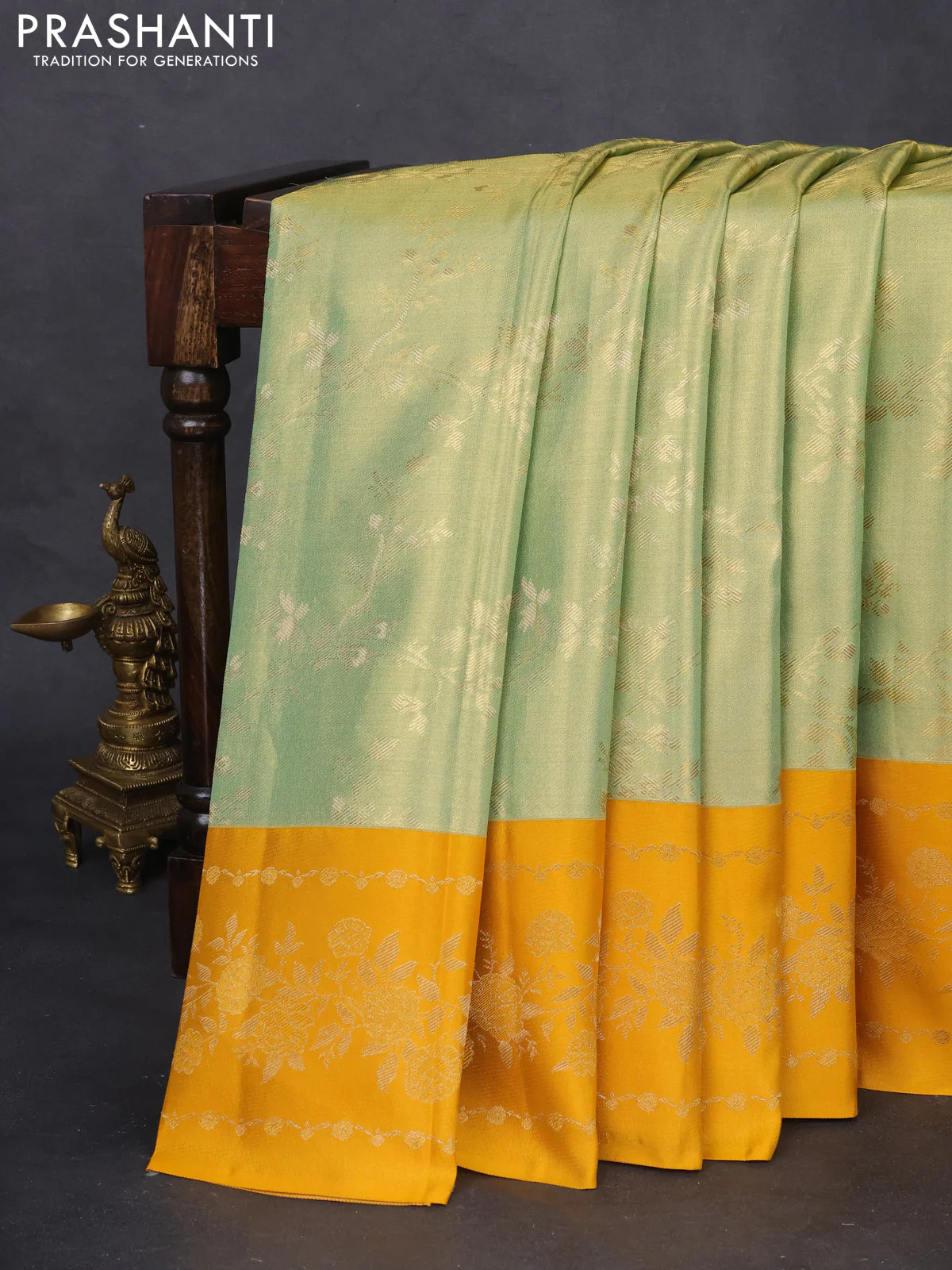 Pure kanchipuram Tissue silk saree pista green and mustard yellow with allover zari weaves and floral design zari border