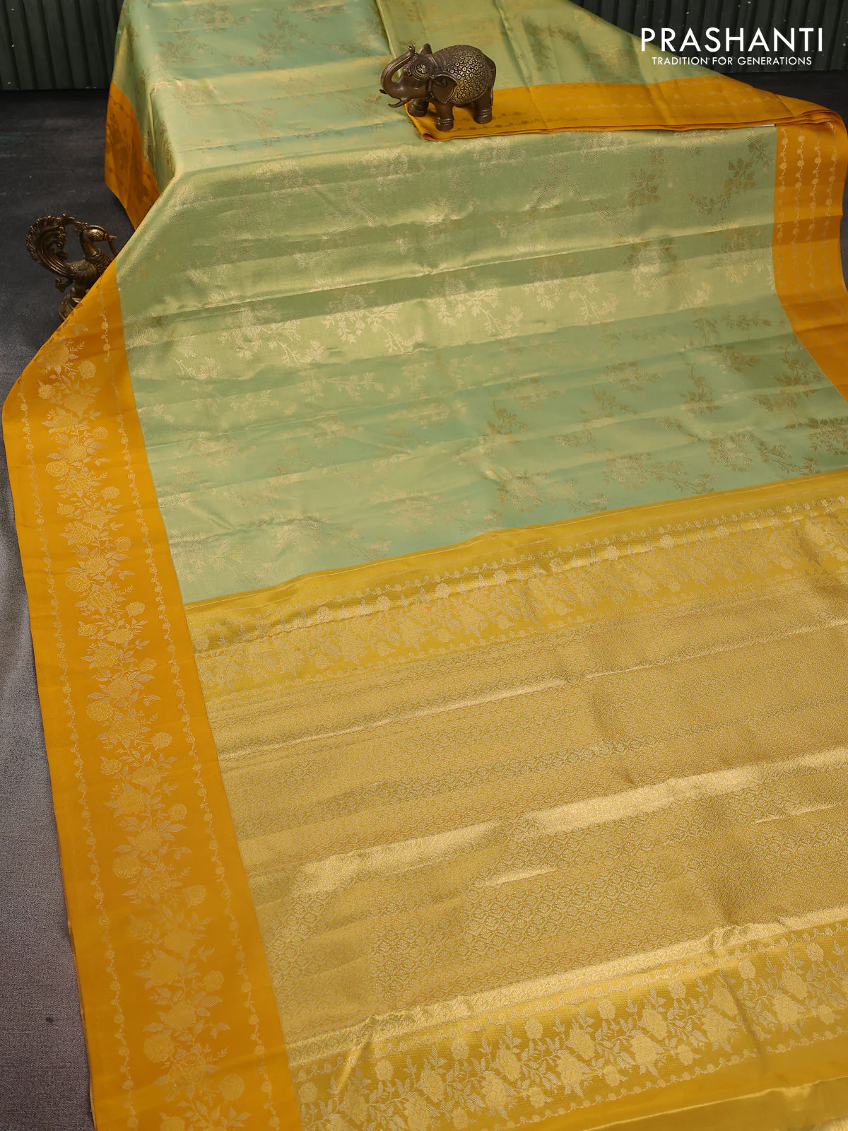 Pure kanchipuram Tissue silk saree pista green and mustard yellow with allover zari weaves and floral design zari border - Image 2