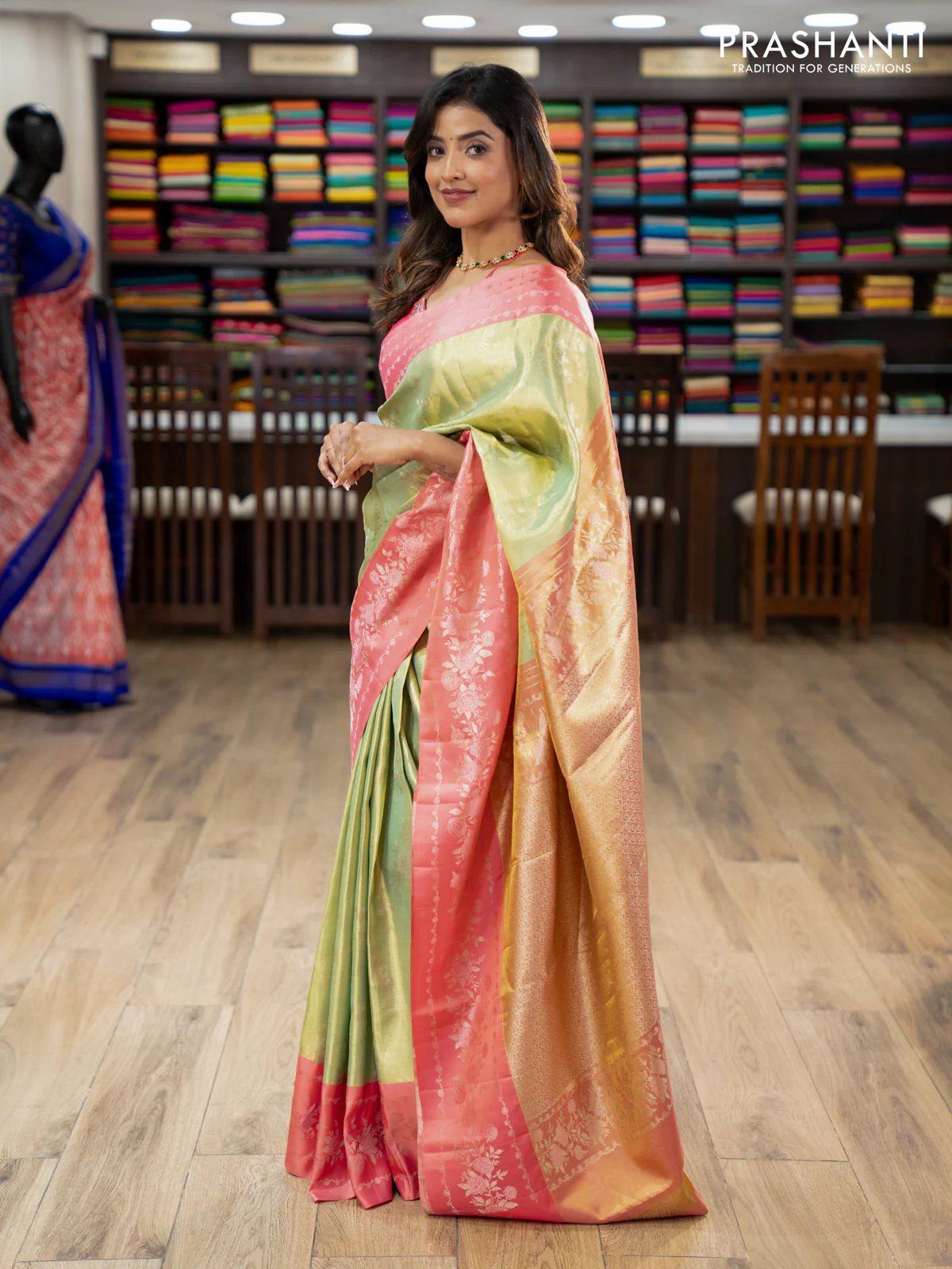Pure kanchipuram Tissue silk saree pista green and peach shade with allover zari weaves and floral design zari border - Image 2